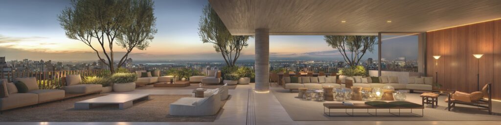Rooftop do empreendimento Zayt da Melnick, com poltronas, sofás e bancos a céu aberto.